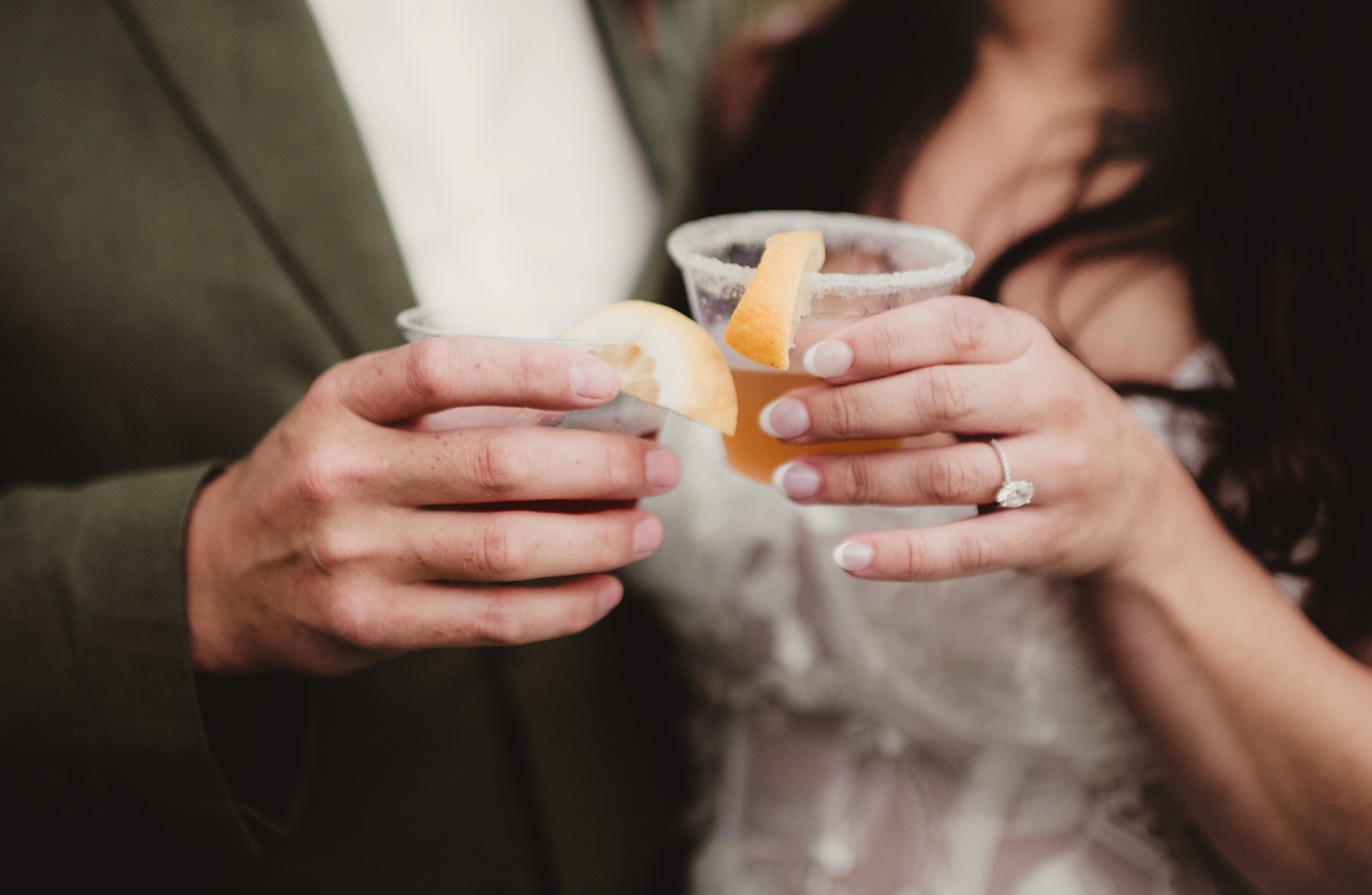 Couple toasting drinks at a celebration